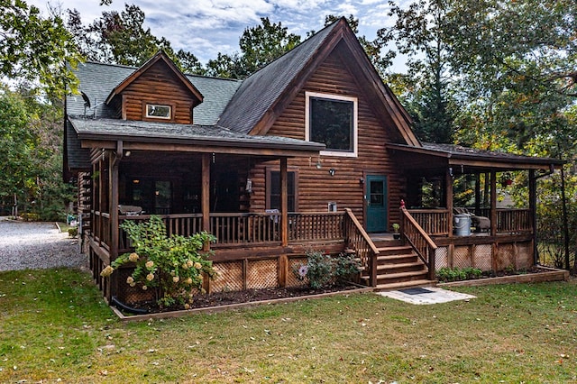 view of front of house featuring a front lawn and covered porch