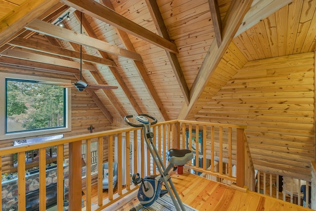 hall featuring lofted ceiling with beams, hardwood / wood-style flooring, and wooden ceiling