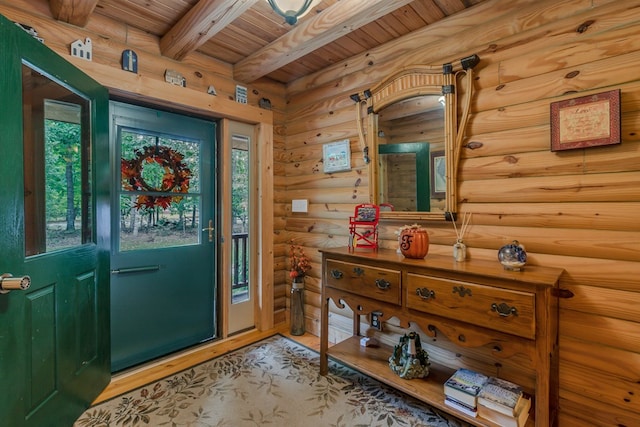 doorway with beam ceiling, wooden ceiling, and rustic walls