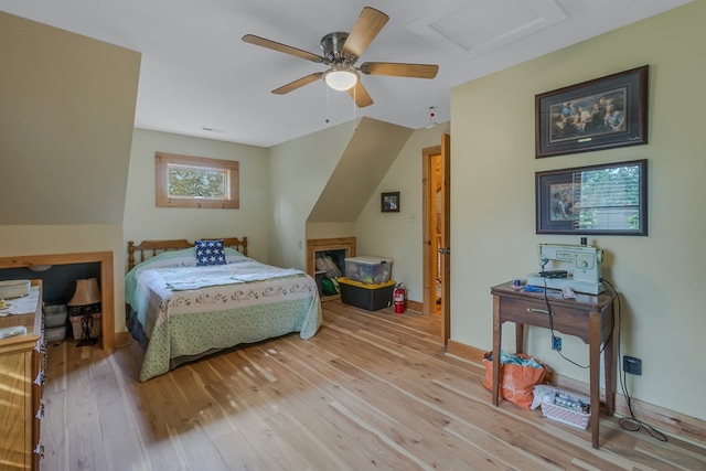 bedroom with ceiling fan and light hardwood / wood-style floors