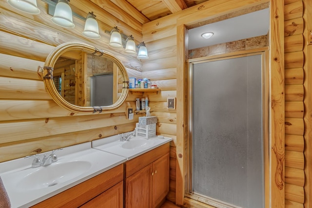 bathroom featuring vanity, an enclosed shower, and rustic walls