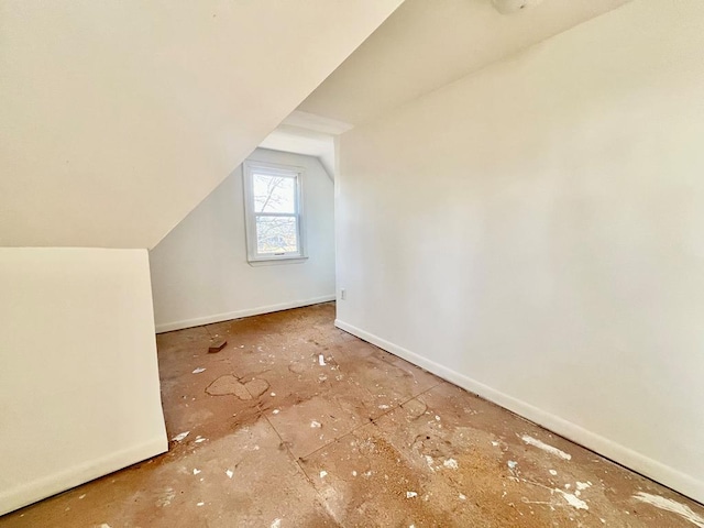 additional living space with lofted ceiling