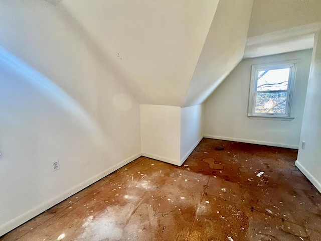 additional living space with lofted ceiling