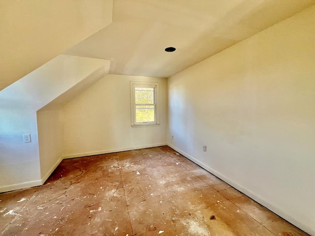 additional living space with lofted ceiling