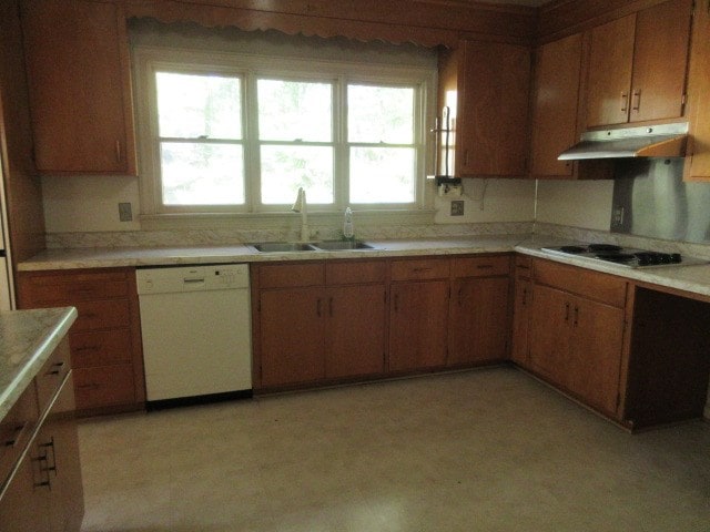 kitchen with sink and white appliances