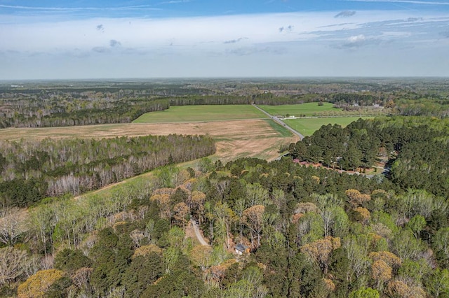 drone / aerial view with a view of trees