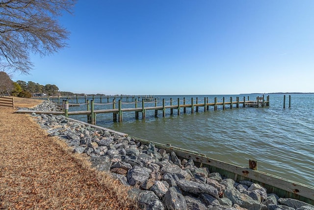 dock area featuring a water view