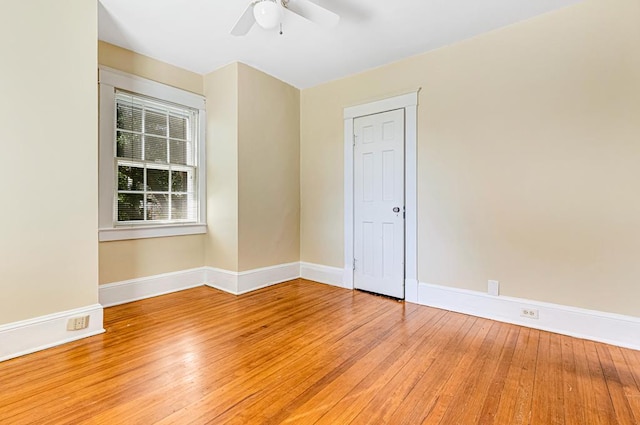 spare room featuring ceiling fan and wood-type flooring