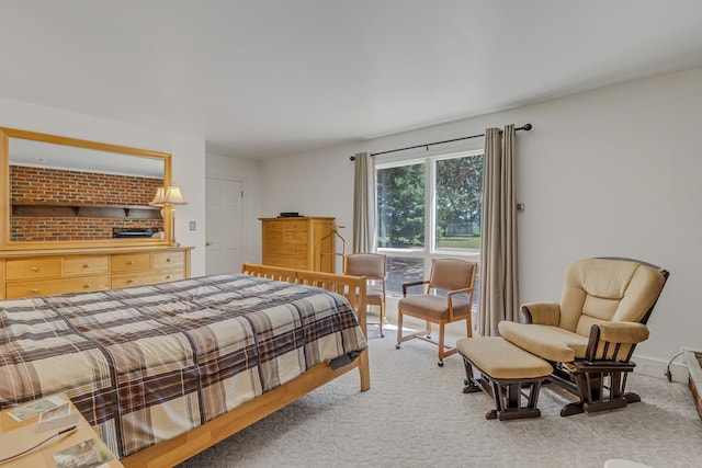 bedroom featuring carpet flooring and baseboards