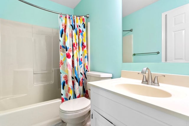 full bathroom featuring vanity, toilet, and shower / tub combo