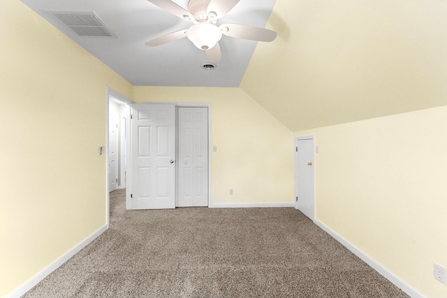 bonus room featuring light carpet, vaulted ceiling, and ceiling fan