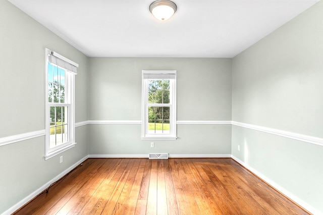 empty room with light wood-type flooring