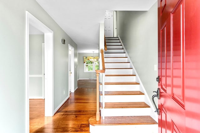 stairs with wood-type flooring