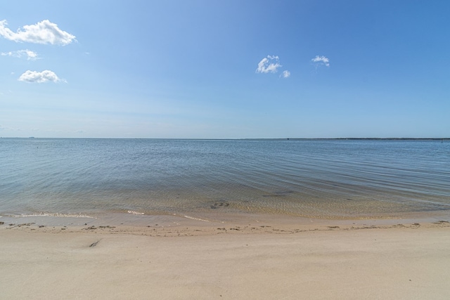 property view of water featuring a view of the beach