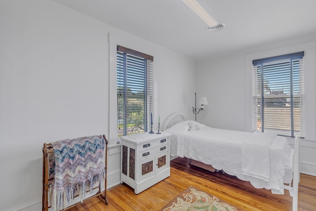 bedroom featuring light hardwood / wood-style flooring