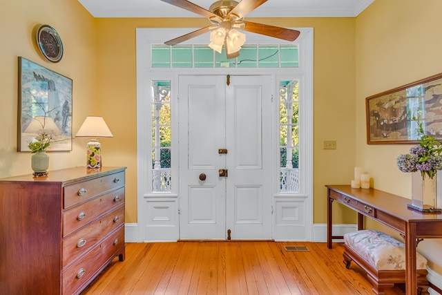 19 Cedardale Ln, Irvington, VA 22480 - foyer entrance featuring ceiling fan and light wood finished floors