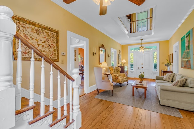 19 Cedardale Ln, Irvington, VA 22480 - living area with a ceiling fan, light wood-type flooring, ornamental molding, and stairway