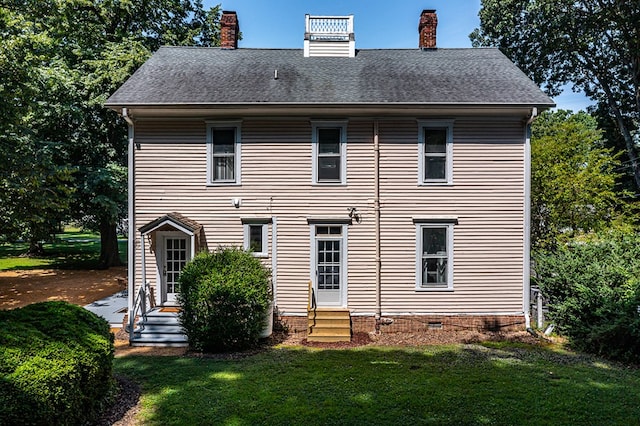 19 Cedardale Ln, Irvington, VA 22480 - back of property featuring entry steps, a yard, a chimney, and crawl space