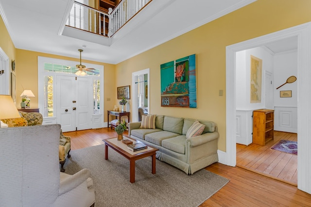 19 Cedardale Ln, Irvington, VA 22480 - living area featuring light wood-style floors, crown molding, and ceiling fan