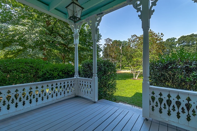 19 Cedardale Ln, Irvington, VA 22480 - wooden porch with a yard and view of scattered trees
