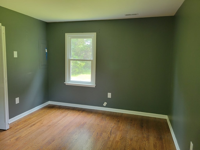 467 The Hook Rd, Warsaw, VA 22572 - unfurnished room with baseboards and wood finished floors