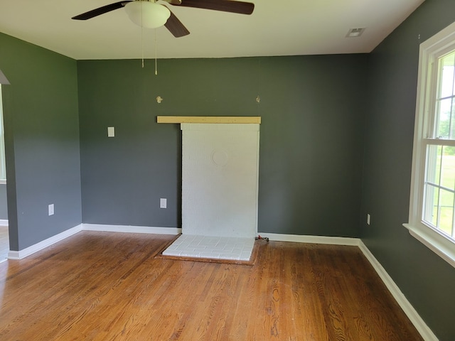 467 The Hook Rd, Warsaw, VA 22572 - empty room with ceiling fan and wood finished floors