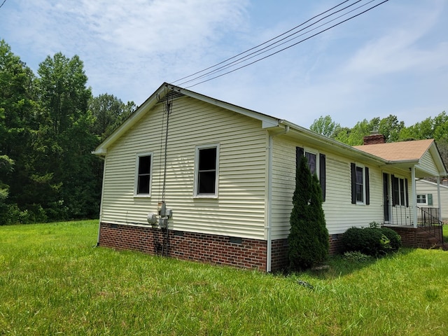 467 The Hook Rd, Warsaw, VA 22572 - view of property exterior featuring crawl space, a lawn, and a chimney