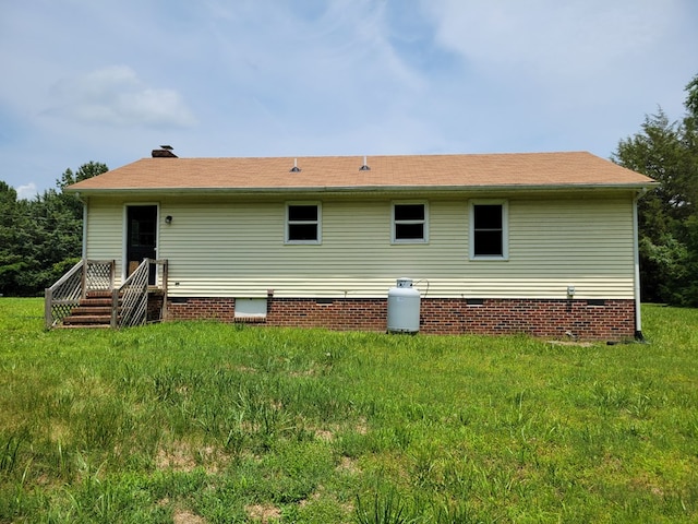 467 The Hook Rd, Warsaw, VA 22572 - rear view of property featuring crawl space and a lawn