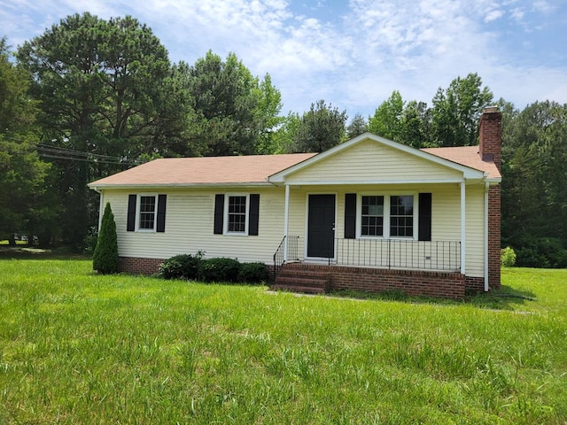 467 The Hook Rd, Warsaw, VA 22572 - ranch-style home featuring a chimney, a porch, and a front lawn