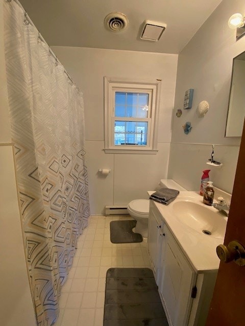 full bathroom with a baseboard heating unit, visible vents, vanity, and toilet