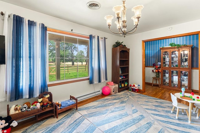 31 Bunker Hill Rd, Farnham, VA 22460 - game room with a chandelier and wood finished floors