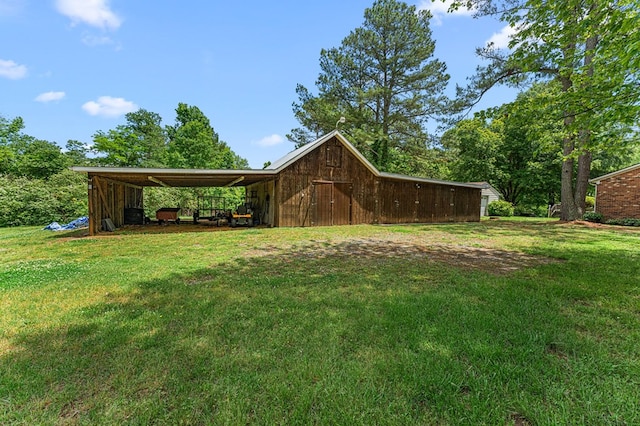 31 Bunker Hill Rd, Farnham, VA 22460 - view of green lawn featuring a pole building and an outdoor structure