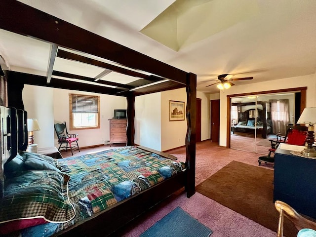 bedroom with beamed ceiling, carpet flooring, a closet, and ceiling fan