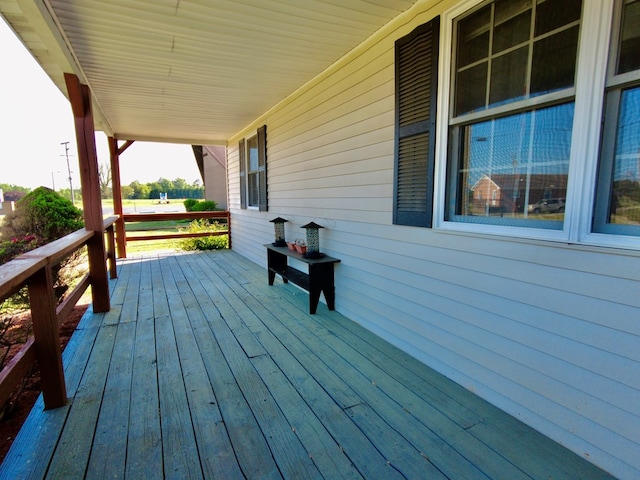 wooden deck featuring covered porch