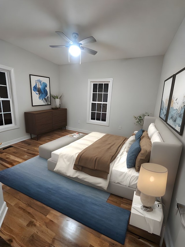 282 Regina Rd, Lancaster, VA 22503 - bedroom featuring wood finished floors, a ceiling fan, and baseboards