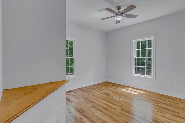 282 Regina Rd, Lancaster, VA 22503 - unfurnished room with light wood-style flooring, baseboards, and a ceiling fan