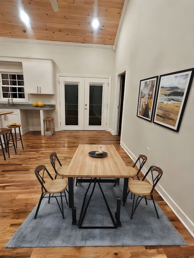 282 Regina Rd, Lancaster, VA 22503 - dining area featuring crown molding, french doors, wood finished floors, baseboards, and wood ceiling
