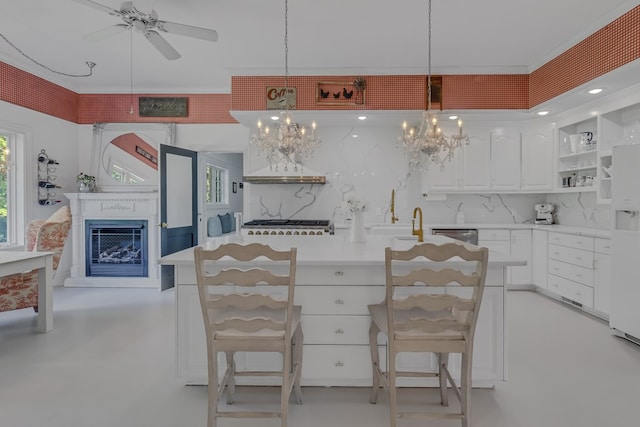 kitchen with decorative backsplash, light countertops, a fireplace, white cabinetry, and open shelves