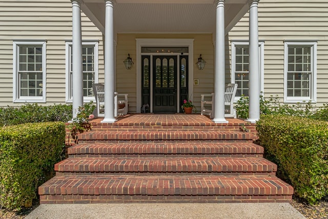 entrance to property with covered porch