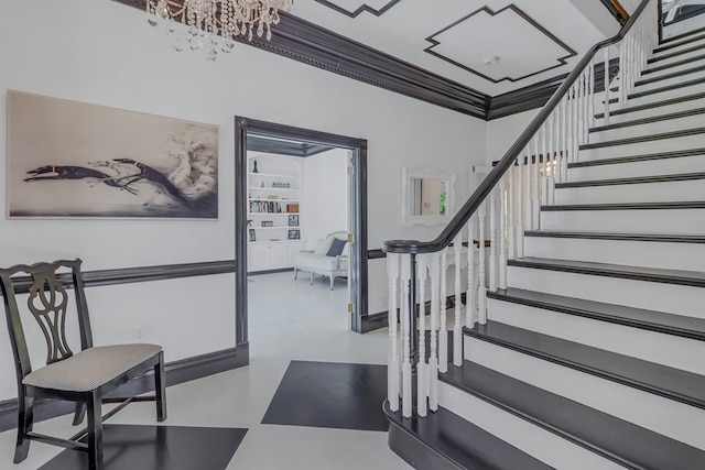 entryway featuring stairway, concrete flooring, and crown molding