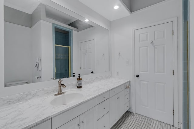 bathroom with toilet, a stall shower, tile patterned floors, and vanity