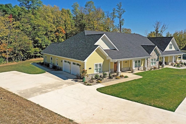 craftsman-style house featuring a front lawn