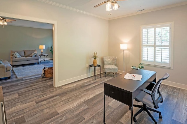 office space with crown molding, ceiling fan, and dark hardwood / wood-style flooring