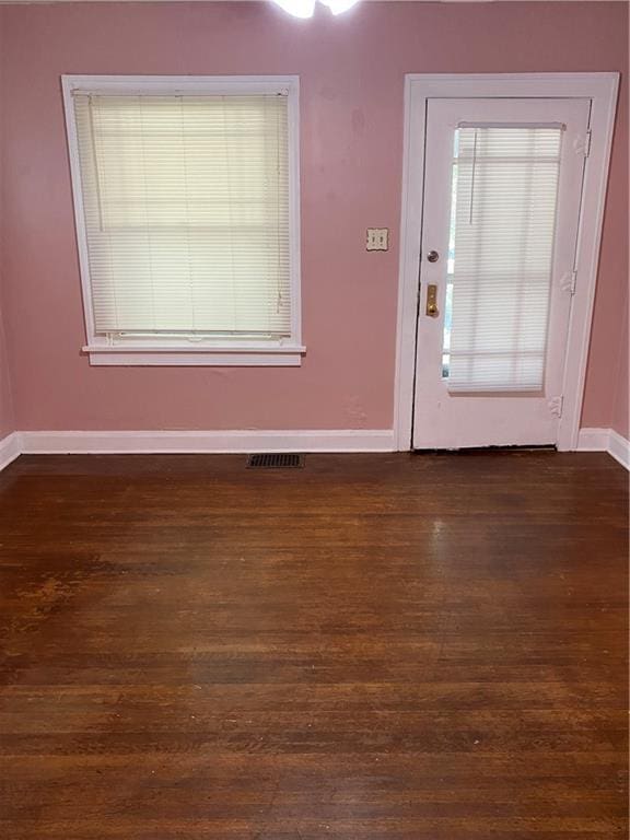 interior space featuring dark wood-type flooring