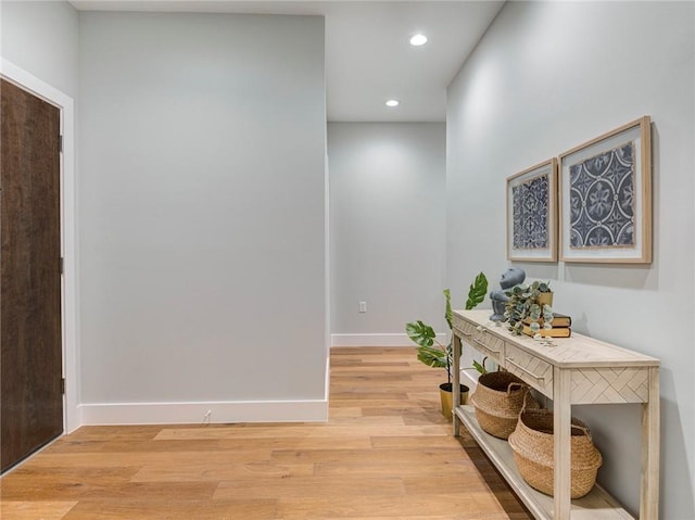 hall with light wood-type flooring