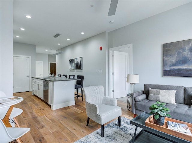 living room with light hardwood / wood-style flooring