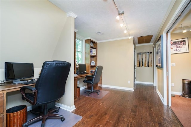 office area featuring track lighting, dark hardwood / wood-style floors, and ornamental molding