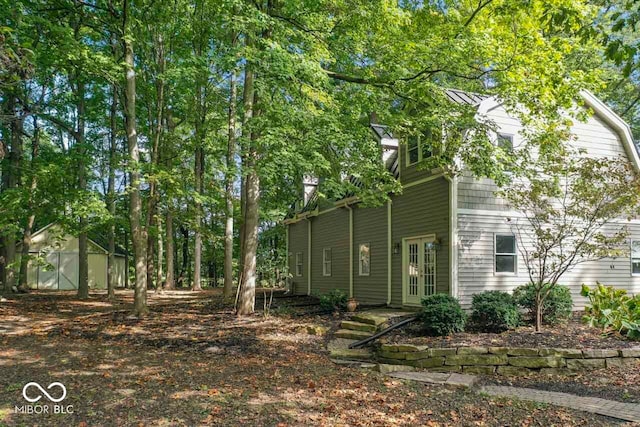 exterior space with a shed