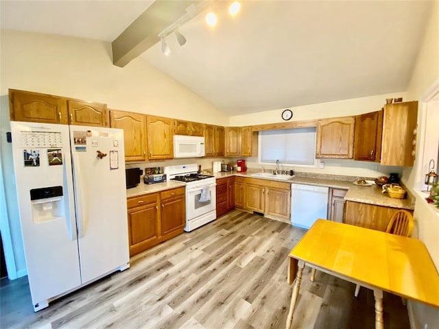 kitchen featuring white appliances, beamed ceiling, sink, light hardwood / wood-style floors, and track lighting