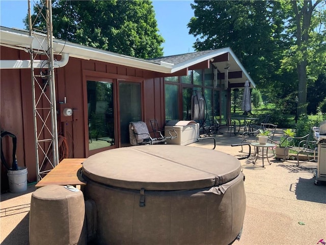 view of patio featuring a hot tub